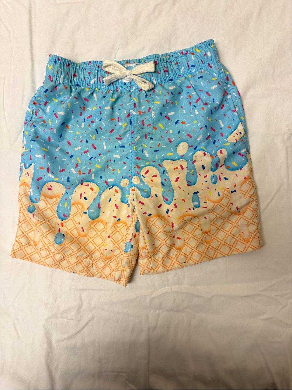 Kids Blue & Cream Ice Cream Drip Swim Trunks with Sprinkles